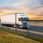 depositphotos_291567052-stock-photo-truck-with-container-on-road